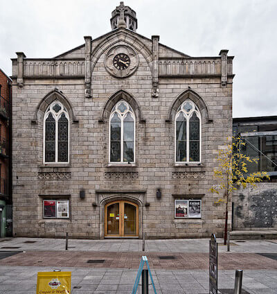 a large building with a clock on top 3 days in Dublin
