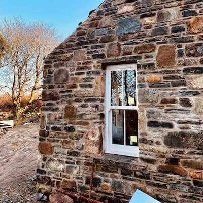the side of a cottage renovating an old cottage in County Donegal
