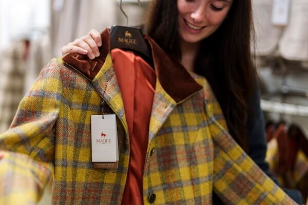 a coat with a label on it Irish souvenirs