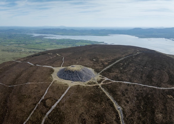 an aerial view of a large mound on a mountain Yeats trail Sligo