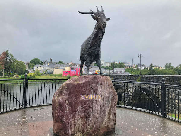 a statue of a goat on top of a rock 4 day trips from Cork City