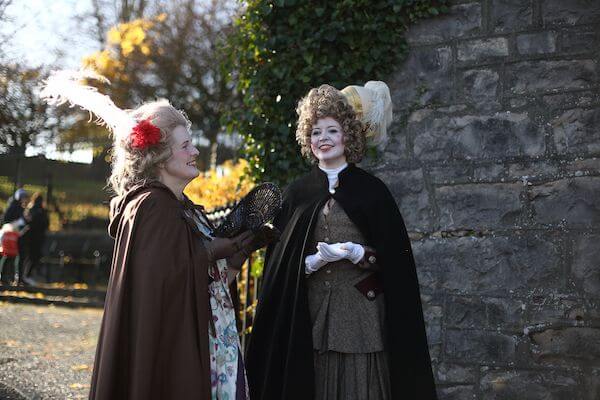 two ladies in dress talking Armagh Georgian Festival