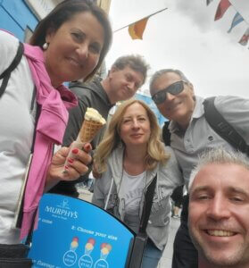 people enjoying an ice cream cone Keogh Tours Ireland