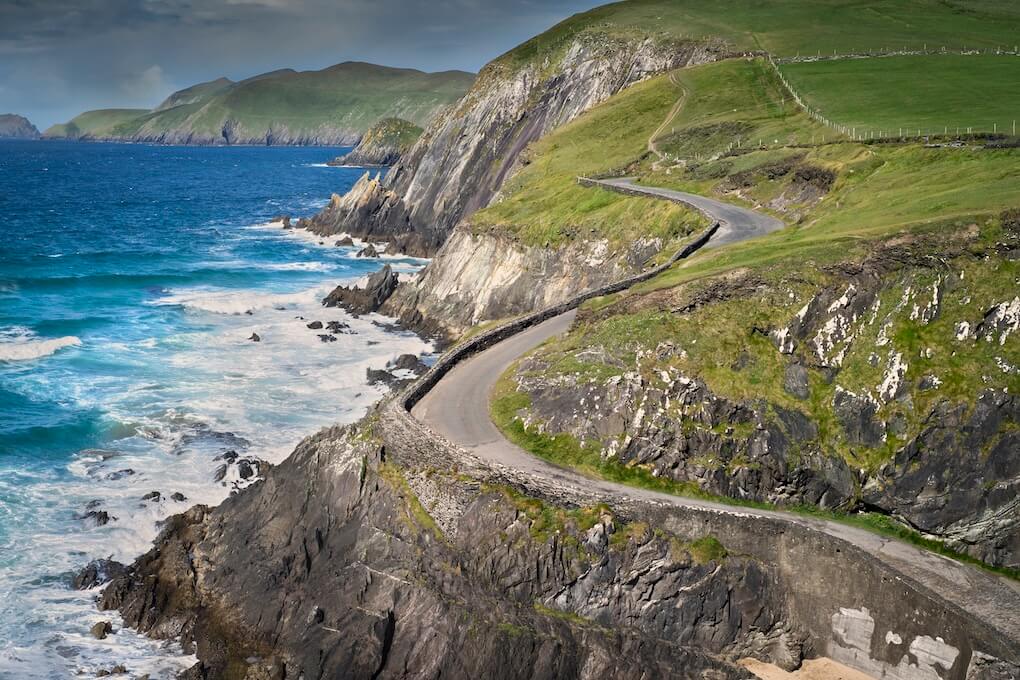 a winding road near the ocean drive like a local with Tripiamo