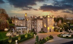 a castle lit up at night Irish castle hotels