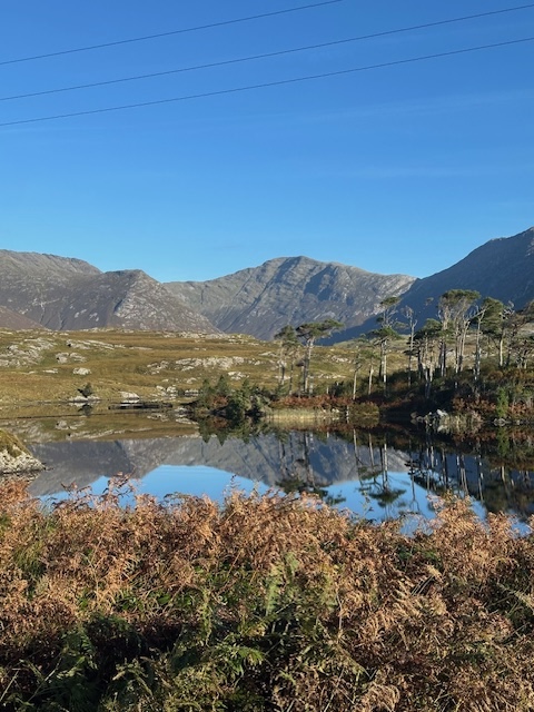  a lake and mountains Colleen Travel Tours
