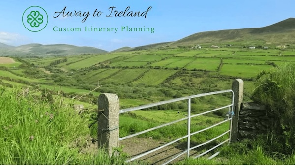 a gate with green fields behind it away to Ireland