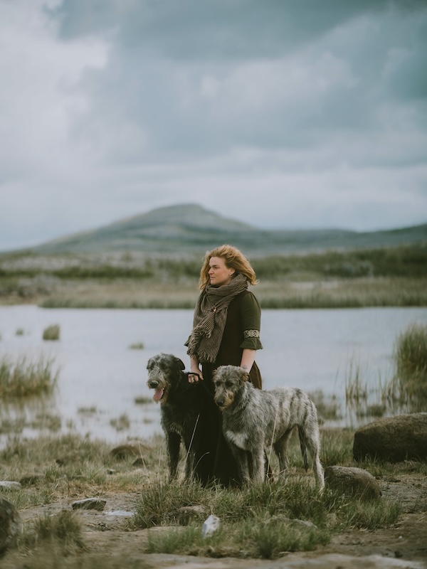 a woman with two dogs Irish wolfhound Experience in Ireland