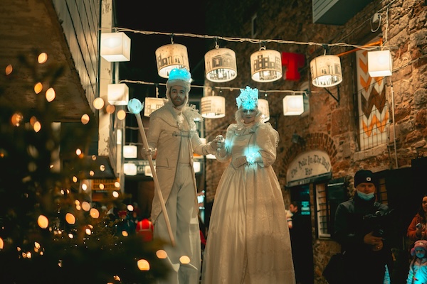 two people on stilts in costume Armagh Georgian Festival